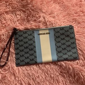 Sky blue Michael Kors purse/wallet. Never used!
